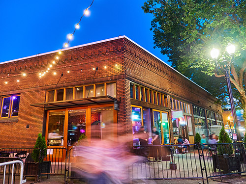 downtown night life scene people walking